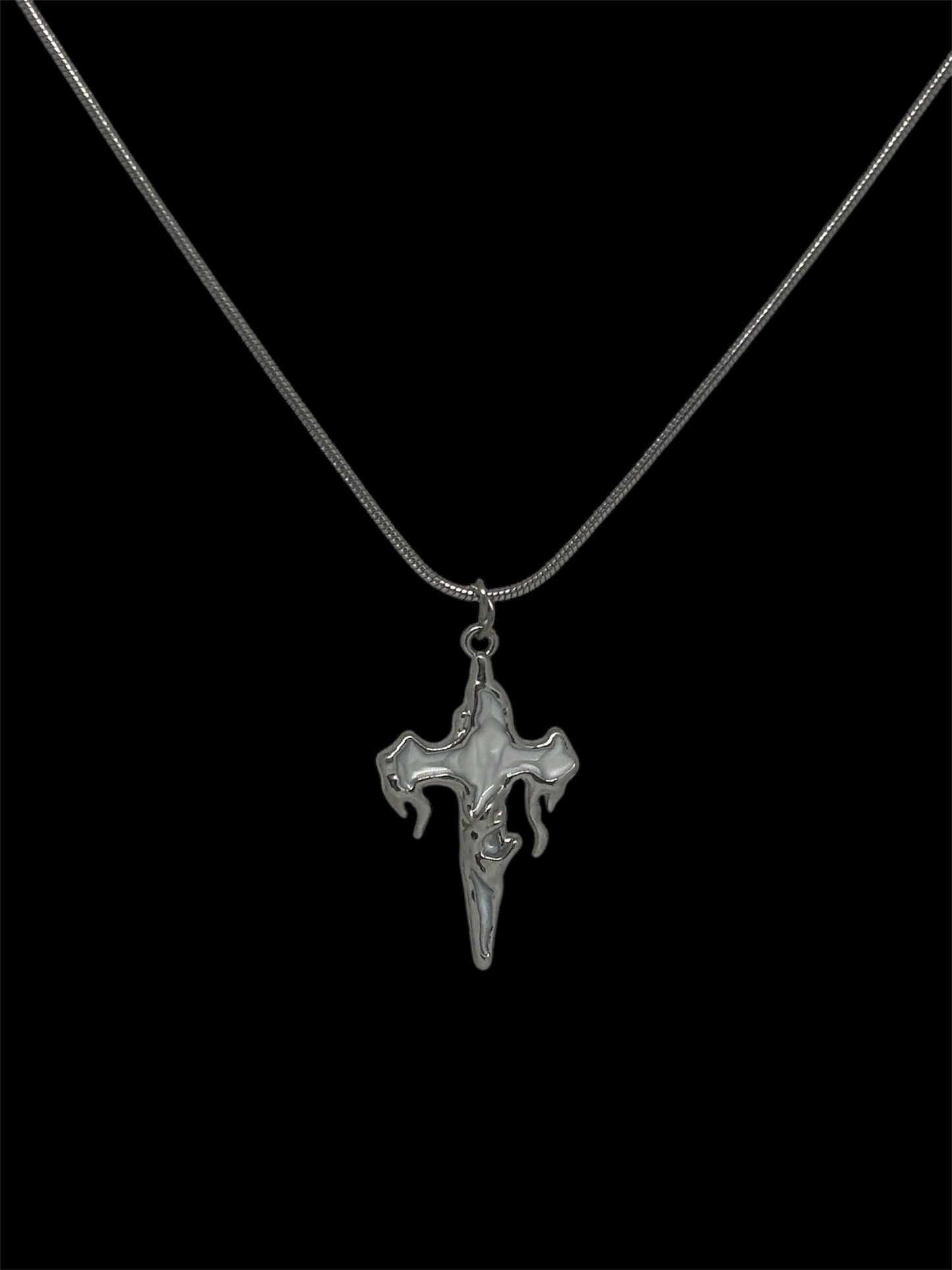 drippy cross necklace