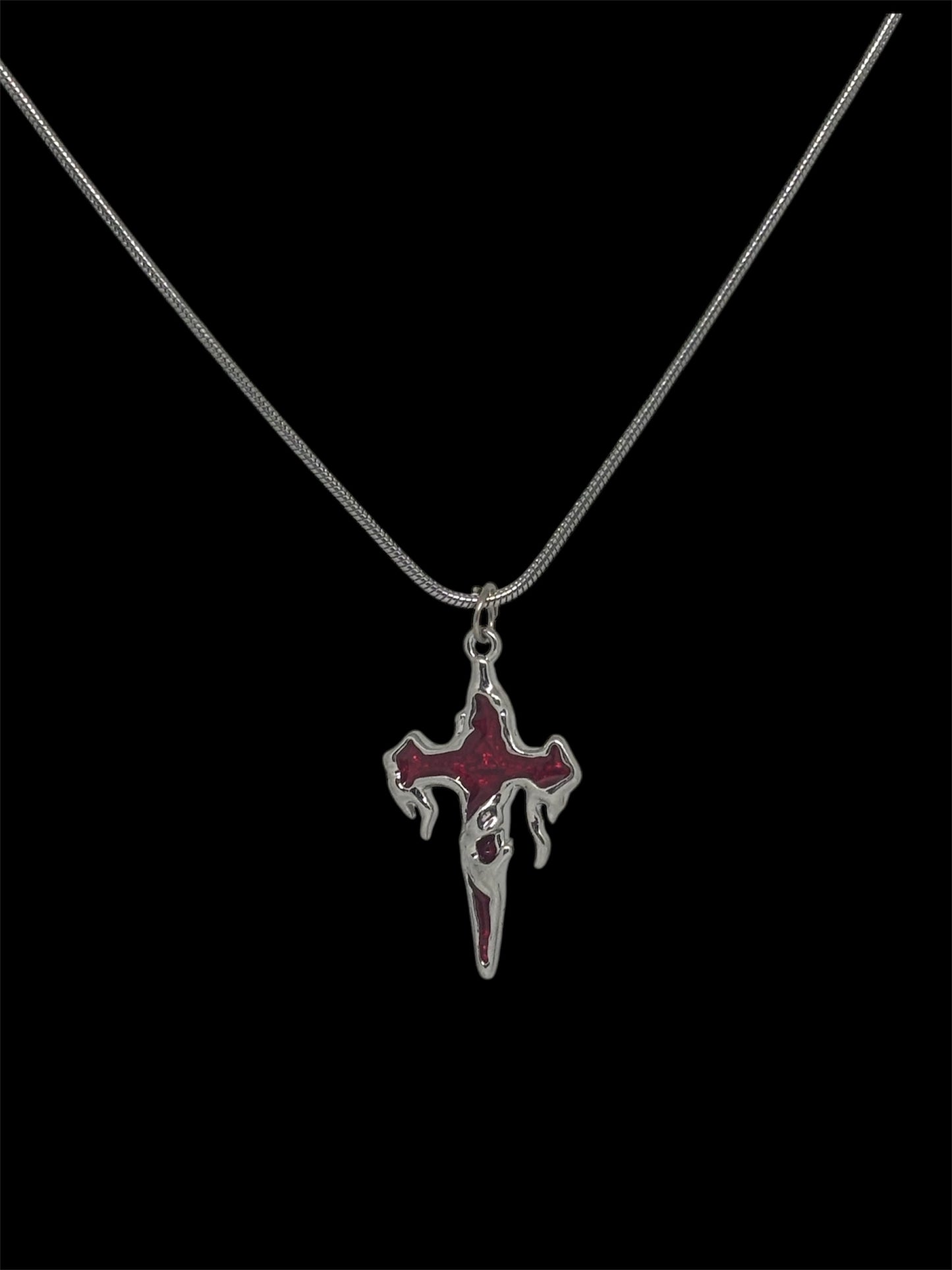 drippy cross necklace